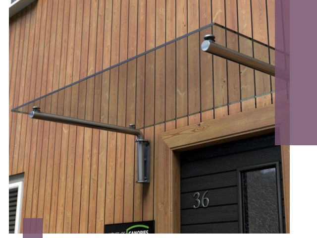 Стеклянные козырьки на входы и фасады в Североморске